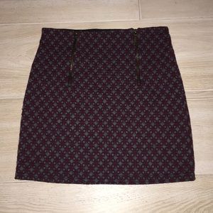 Red and gray patterned skirt